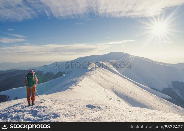 Tourist in Carpathian mountains landscape photo. Beautiful nature scenery photography with blue sky on background. Idyllic scene. High quality picture for wallpaper, travel blog, magazine, article. Tourist in Carpathian mountains landscape photo