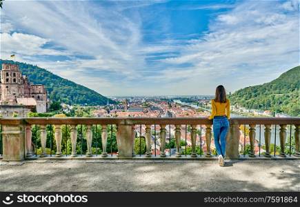Tourist in Heidelberg town on Neckar river in Baden-Wurttemberg, Germany