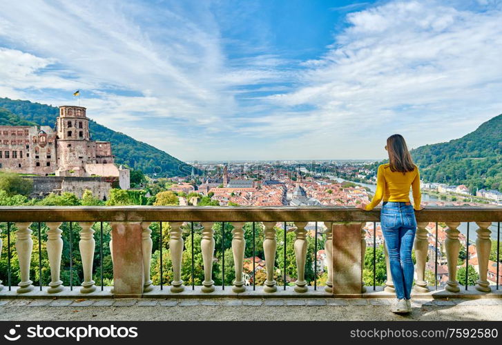 Tourist in Heidelberg town on Neckar river in Baden-Wurttemberg, Germany