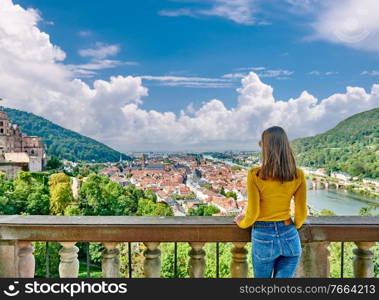 Tourist in Heidelberg town on Neckar river in Baden-Wurttemberg, Germany 