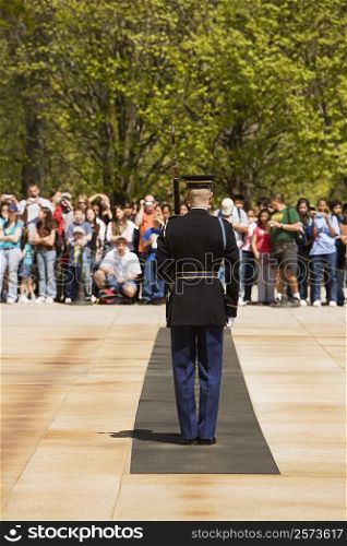 Tourist looking at an honor guard