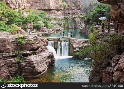 Tourist on a bridge, Mt Yuntai, Jiaozuo, Henan Province, China