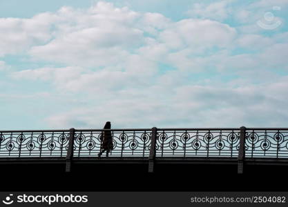 tourist on the bridge visiting Bilbao city, Spain, travel destination