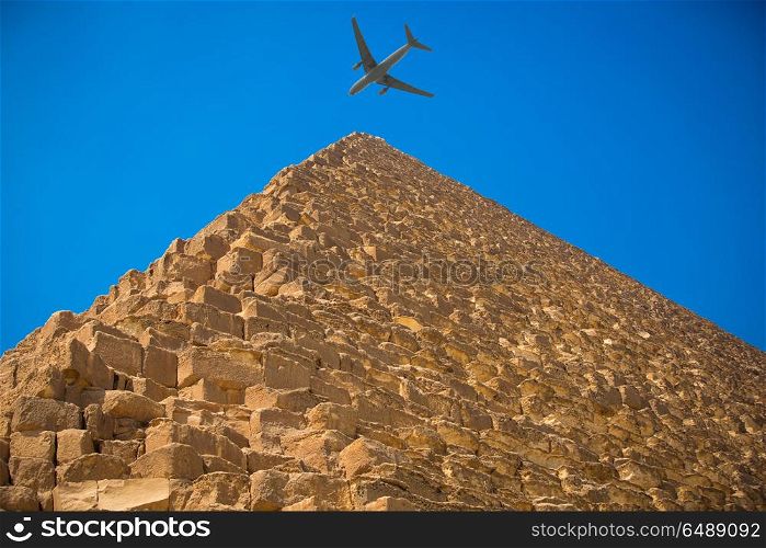 tourist plane flies over the pyramids of Cairo Egypt. pyramids of Giza, in Egypt.