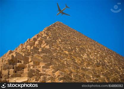 tourist plane flies over the pyramids of Cairo Egypt. pyramids of Giza, in Egypt.