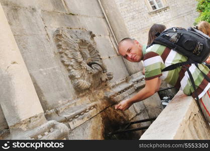 tourist relax and have fun at dubrovnik on adreatic sea at summer vacation