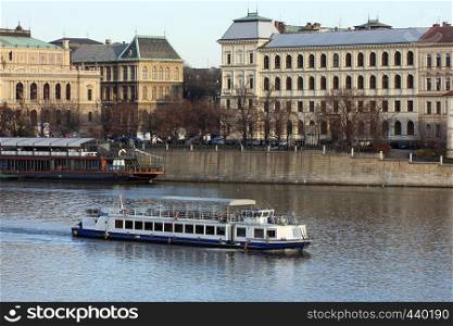 tourist ship on a river Vltava in the Prague, Czech