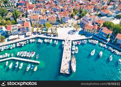 Tourist town of Selce waterfront and colorful architecture aerial view, Crikvenica riviera in Croatia