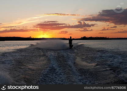 Tourist waterskiing in a lake, Lake of the Woods, Ontario, Canada