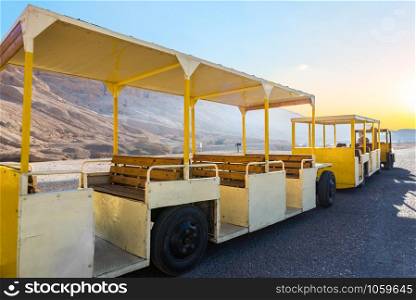 Touristic bus in desert of Luxor near Hatshepsut temple, Egypt. Touristic bus in Egypt
