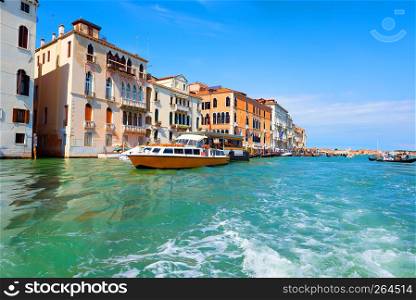 Touristic Venice in Grand Canal at summer day