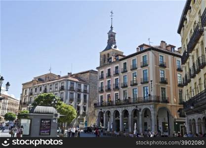 Tourists and locals alike enjoying life in Plaza Mayor, Segovia, Spain