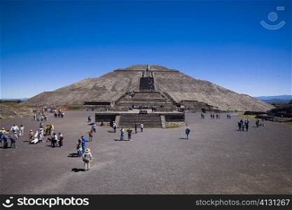 Tourists around a pyramid, Pyramid of the Sun, Teotihuacan, Mexico
