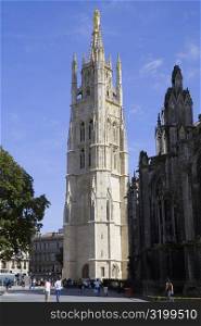 Tourists at a church, St. Andre Cathedral, Tour Pey Berland, Bordeaux, Aquitaine, France