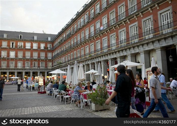Tourists at a sidewalk cafe, Plaza Mayor, Madrid, Spain