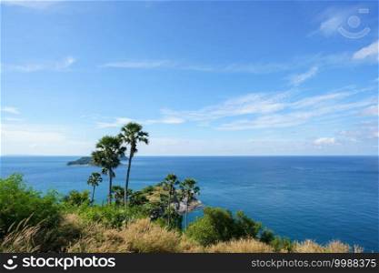 Tourists at Phromthep cape viewpoint at the south of Phuket Island, Thailand. Tropical paradise in Thailand. Phuket is a popular destination famous for tourists