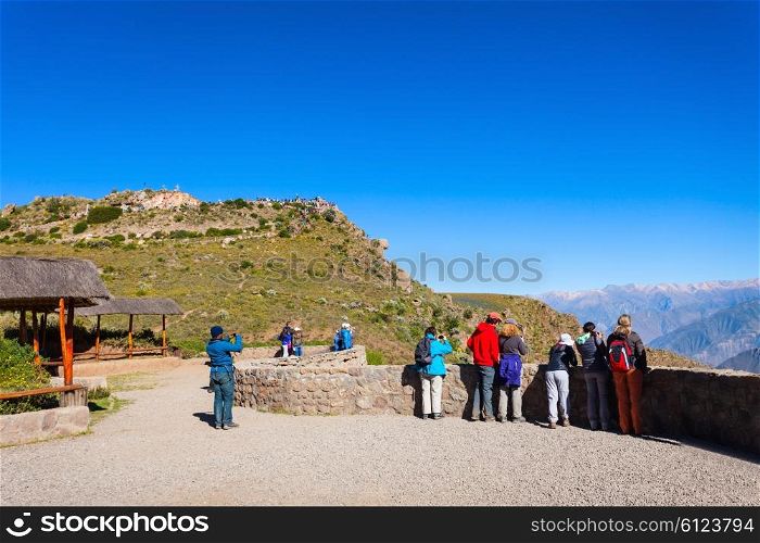 Tourists at the Cruz Del Condor viewpoint, Colca canyon, Peru