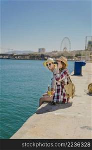 tourists coast with binoculars