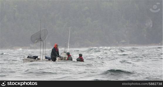 Tourists fishing in the Pacific Ocean, Skeena-Queen Charlotte Regional District, Haida Gwaii, Graham Island, British Columbia, Canada