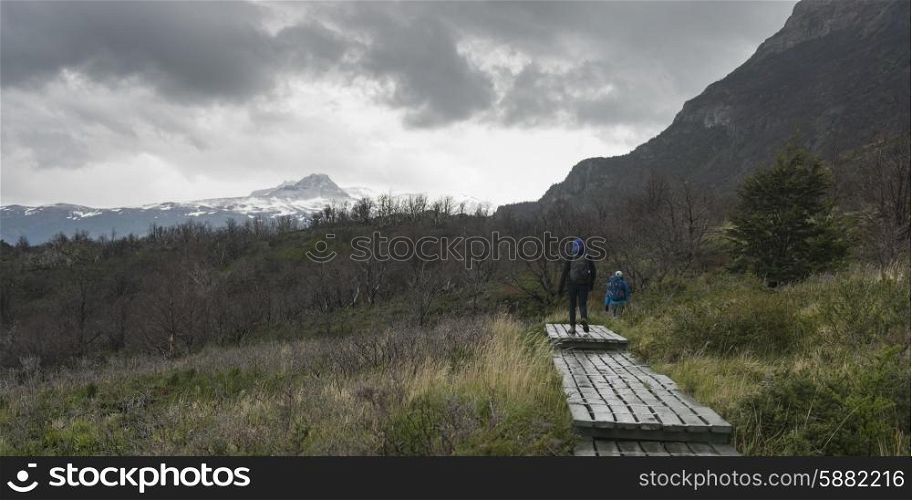 Tourists hiking, Torres Del Paine National Park, Patagonia, Chile