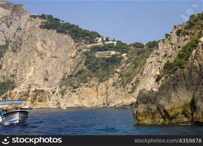 Tourists in a boat, Capri, Campania, Italy