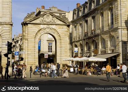 Tourists in a street, Porte Dijeaux, Vieux Bordeaux, Bordeaux, France