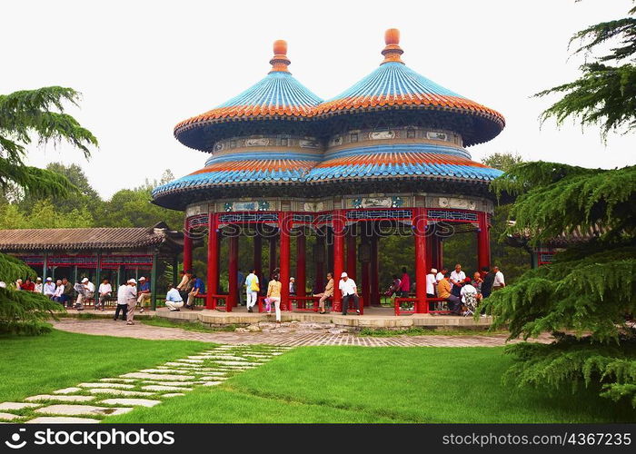 Tourists in a temple, Double Ring Longevity Pavilion, Temple of Heaven, Beijing, China