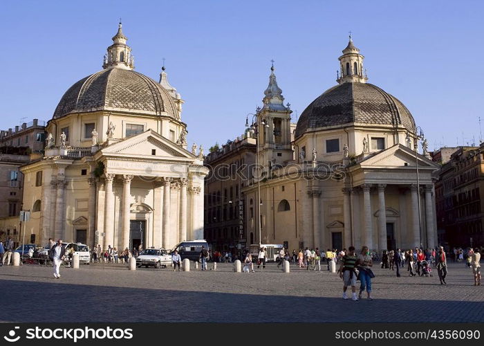 Tourists in front churches, Santa Maria Dei Miracoli, Santa Maria Di Montesanto, Piazza Del Popolo, Rome, Italy