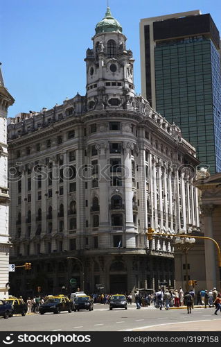 Tourists in front of a building, Plaza De Mayo, Barrio De Monserrat, Buenos Aires, Argentina