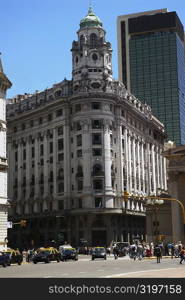 Tourists in front of a building, Plaza De Mayo, Barrio De Monserrat, Buenos Aires, Argentina