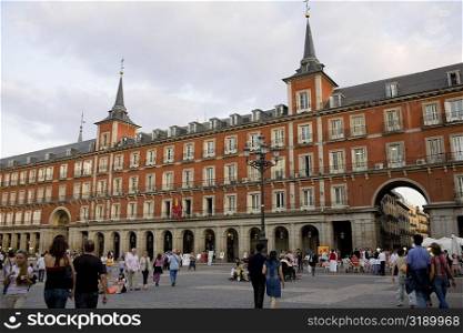 Tourists in front of a building, Plaza Mayor, Madrid, Spain