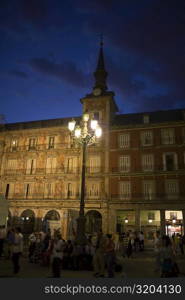 Tourists in front of a building, Plaza Mayor, Madrid, Spain