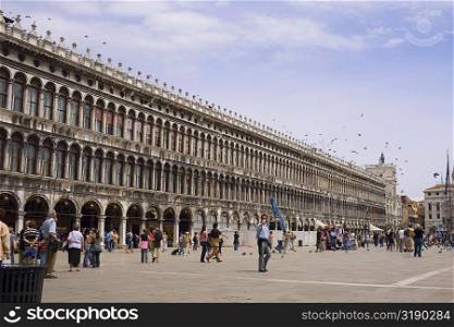 Tourists in front of a building, St. Mark&acute;s Square, Venice, Italy