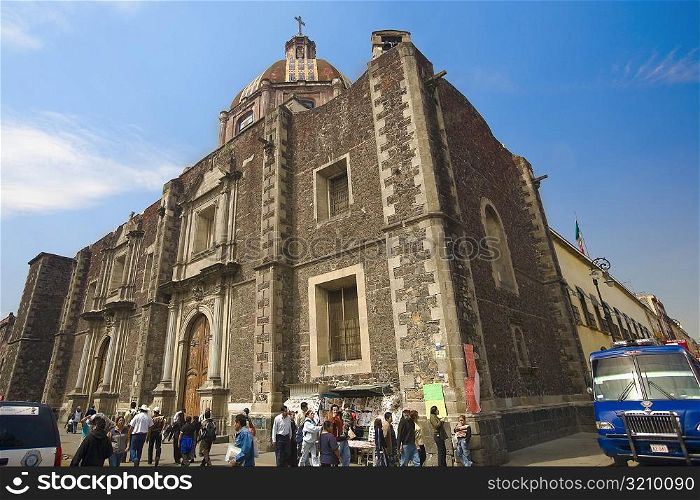 Tourists in front of a cathedral, Temple of Holy Ines, Mexico City, Mexico