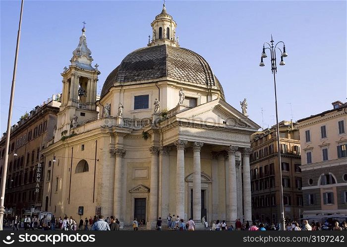 Tourists in front of a church, Santa Maria Di Montesanto, Piazza Del Popolo, Rome, Italy