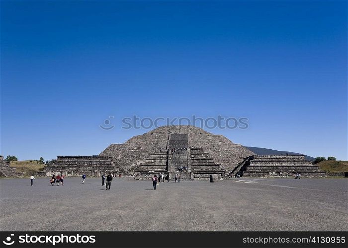 Tourists in front of a pyramid, Piramide De La Luna, Teotihuacan, Mexico