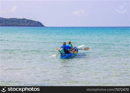 Tourists kayaking sea beautiful area ao bang bao at Koh Kood island Trat, Thailand.