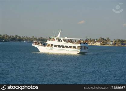 Tourists on a yacht in the sea, Miami, Florida, USA