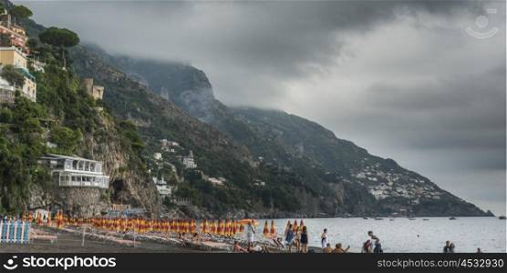 Tourists on beach, Positano, Amalfi Coast, Salerno, Campania, Italy