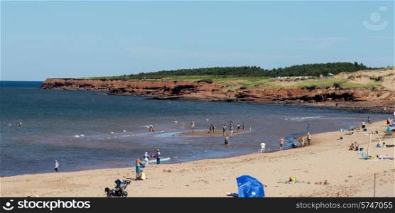 Tourists on the beach, Cavendish Beach, Green Gables, Prince Edward Island, Canada