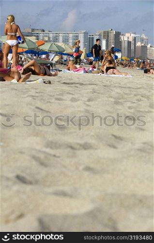 Tourists on the beach, Miami Beach, Florida, USA