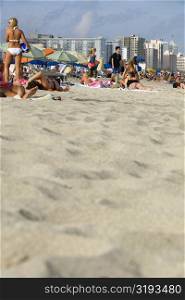 Tourists on the beach, Miami Beach, Florida, USA