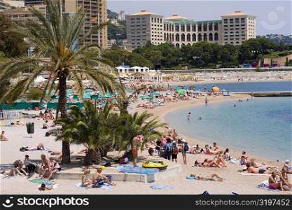 Tourists on the beach, Monte Carlo, Monaco