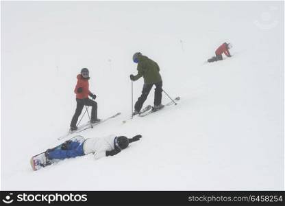 Tourists skiing on snowy mountain, Whistler, British Columbia, Canada