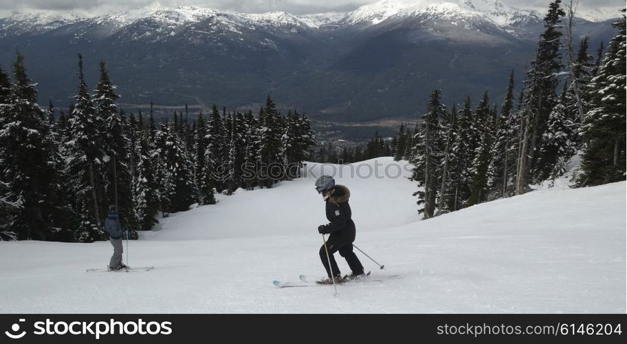 Tourists skiing, Whistler, British Columbia, Canada