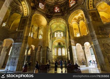 Tourists visiting the Basilica of San Vitale in Ravenna, Italy