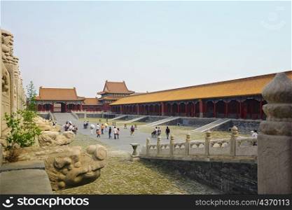 Tourists walking in a palace, Forbidden City, Beijing, China