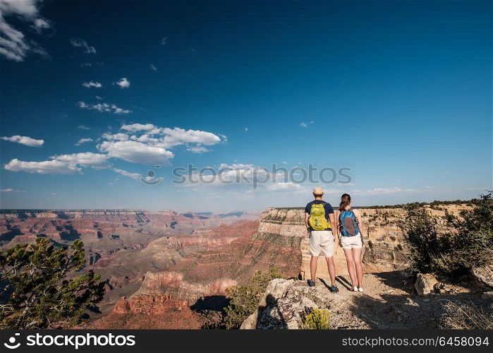 Tourists with backpack hiking at Grand Canyon, Arizona, USA