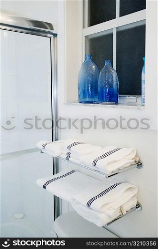 Towels on racks in the bathroom