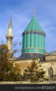 Tower and minaret on the roof on Mevlana mosque in Konya, Turkey